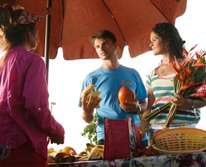 Learning about locally grown fruits and vegetables at the Kapaa Farmers Market